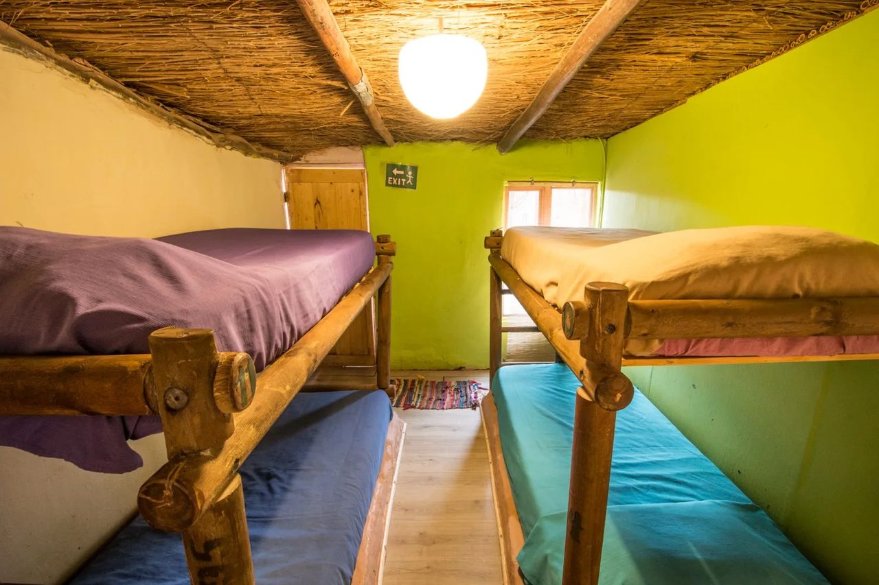 Dormitorio Femenino 4 Camas — Saire — Ají Verde Hostel San Pedro